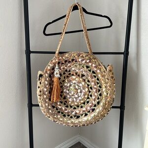Hand made jute bag.  Gorgeous unique piece. Great for the beach.